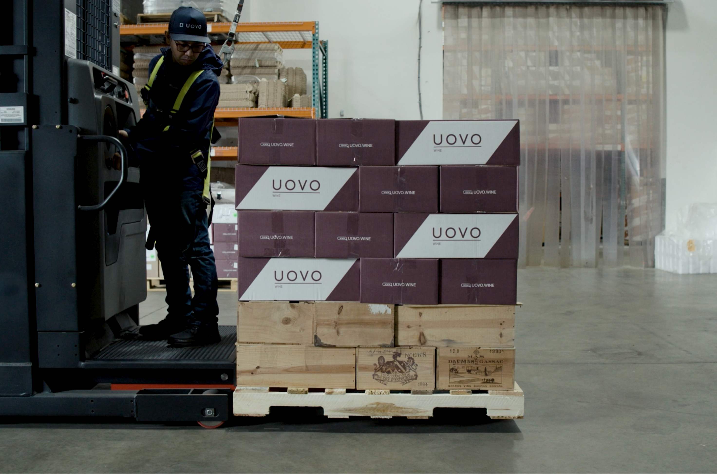 UOVO worker loading wine cases